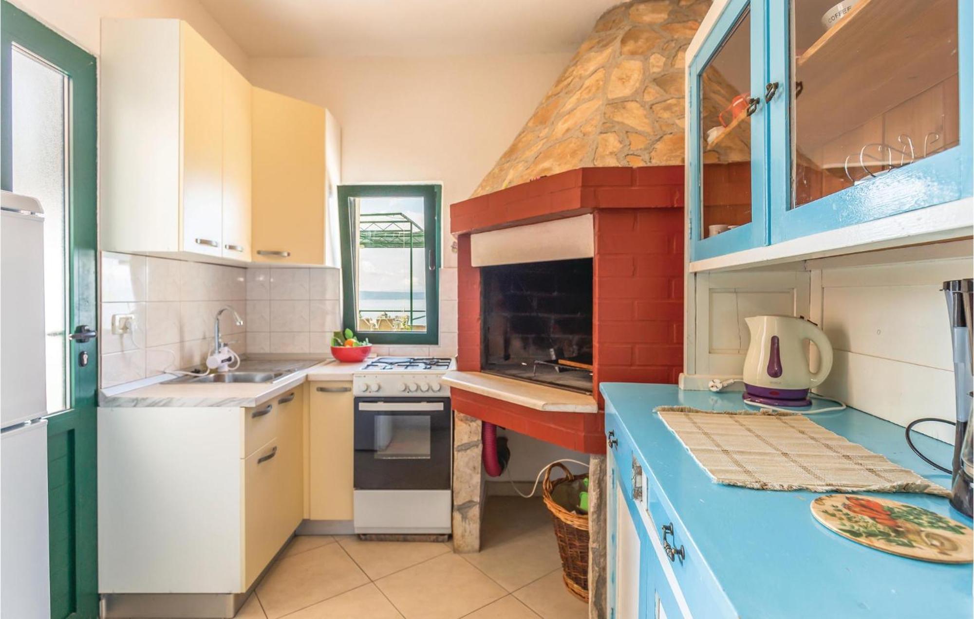 Awesome Home In Podgora With Kitchen Exterior photo